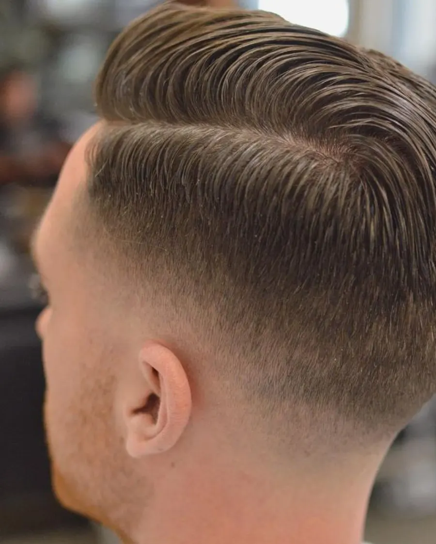 Classic fade side profile showing gradient blend around the temple.