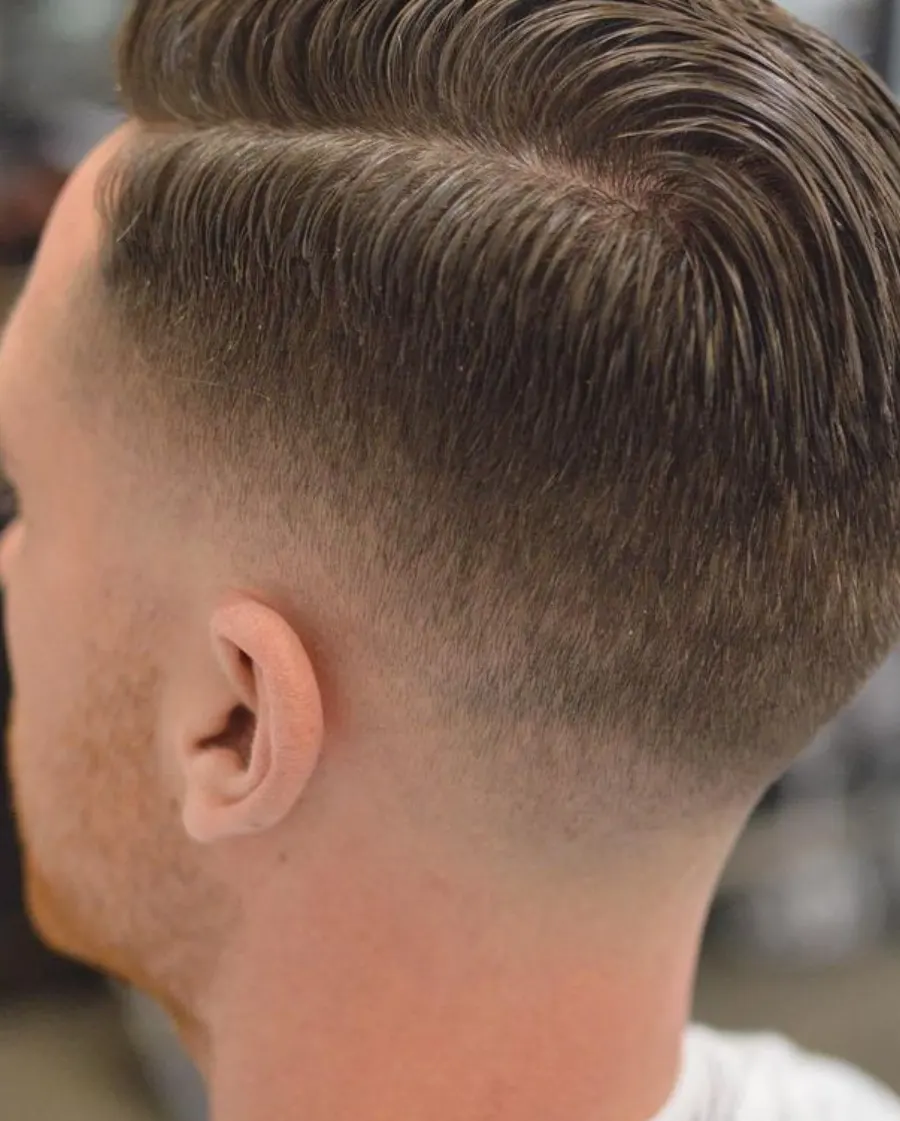 Classic fade three-quarter angle for shape and top texture.