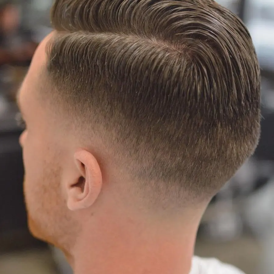 Classic fade top view showing crown and directional flow.